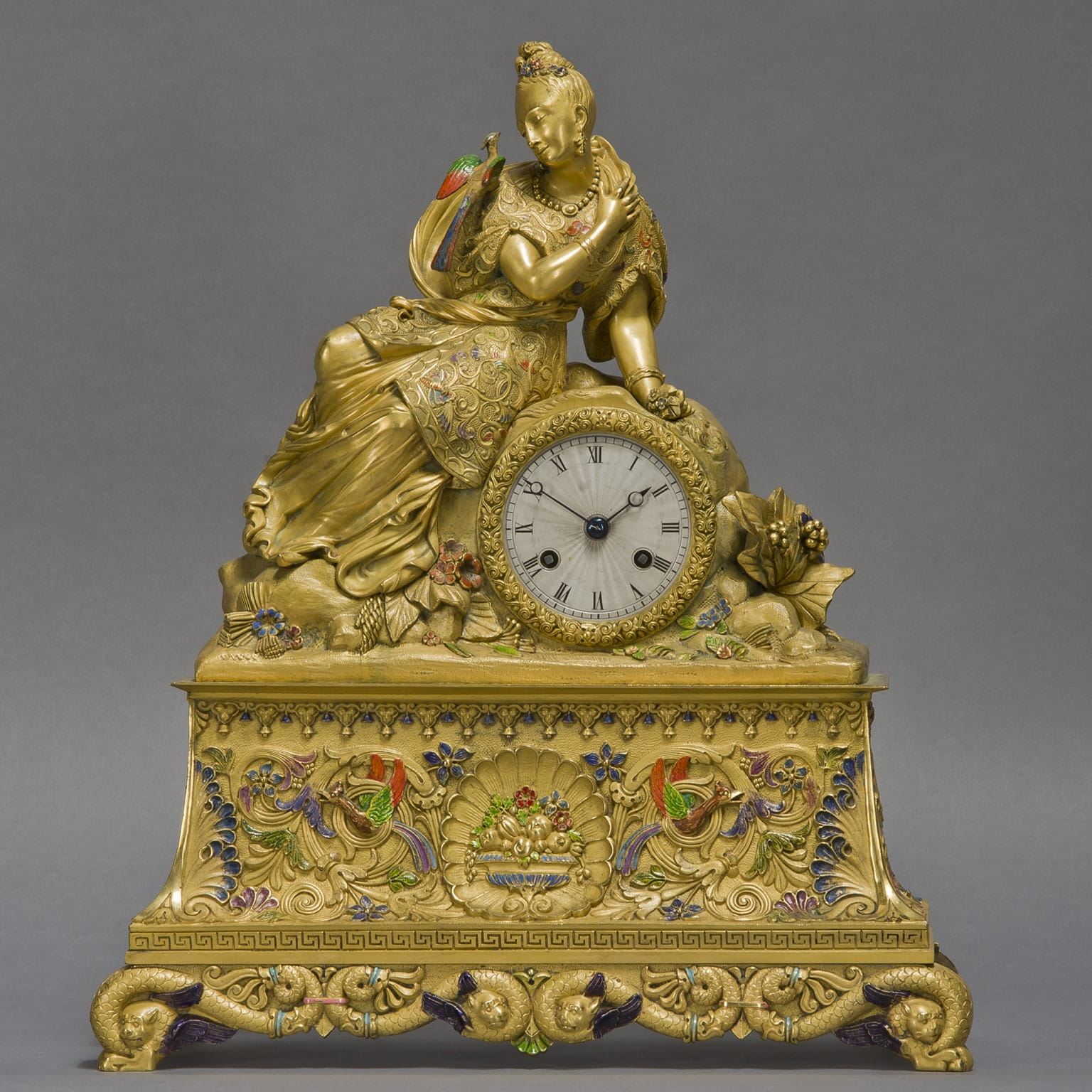 A Chinoiserie Style Gilt-Bronze and Enamel Figural Clock