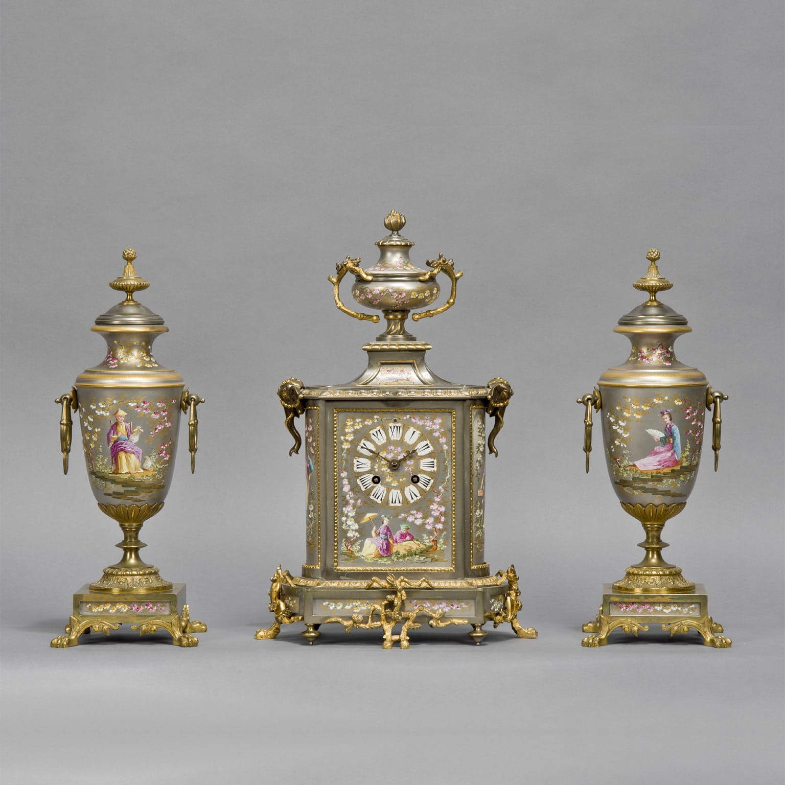 A Fine Napoleon III Gilt-Bronze Mounted Porcelain Clock Garniture