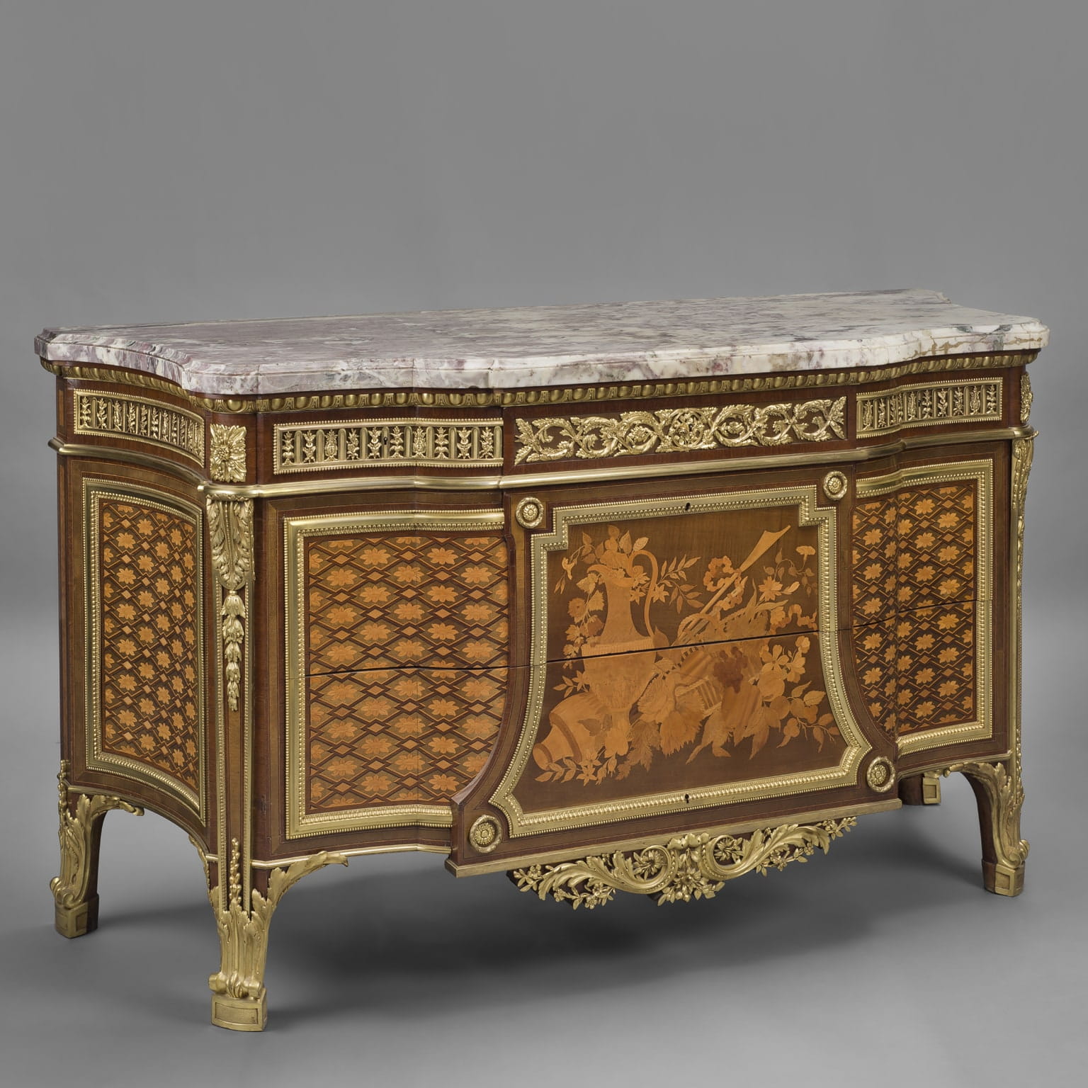 A Very Fine Louis XVI Style Gilt-Bronze Mounted Marquetry Commode