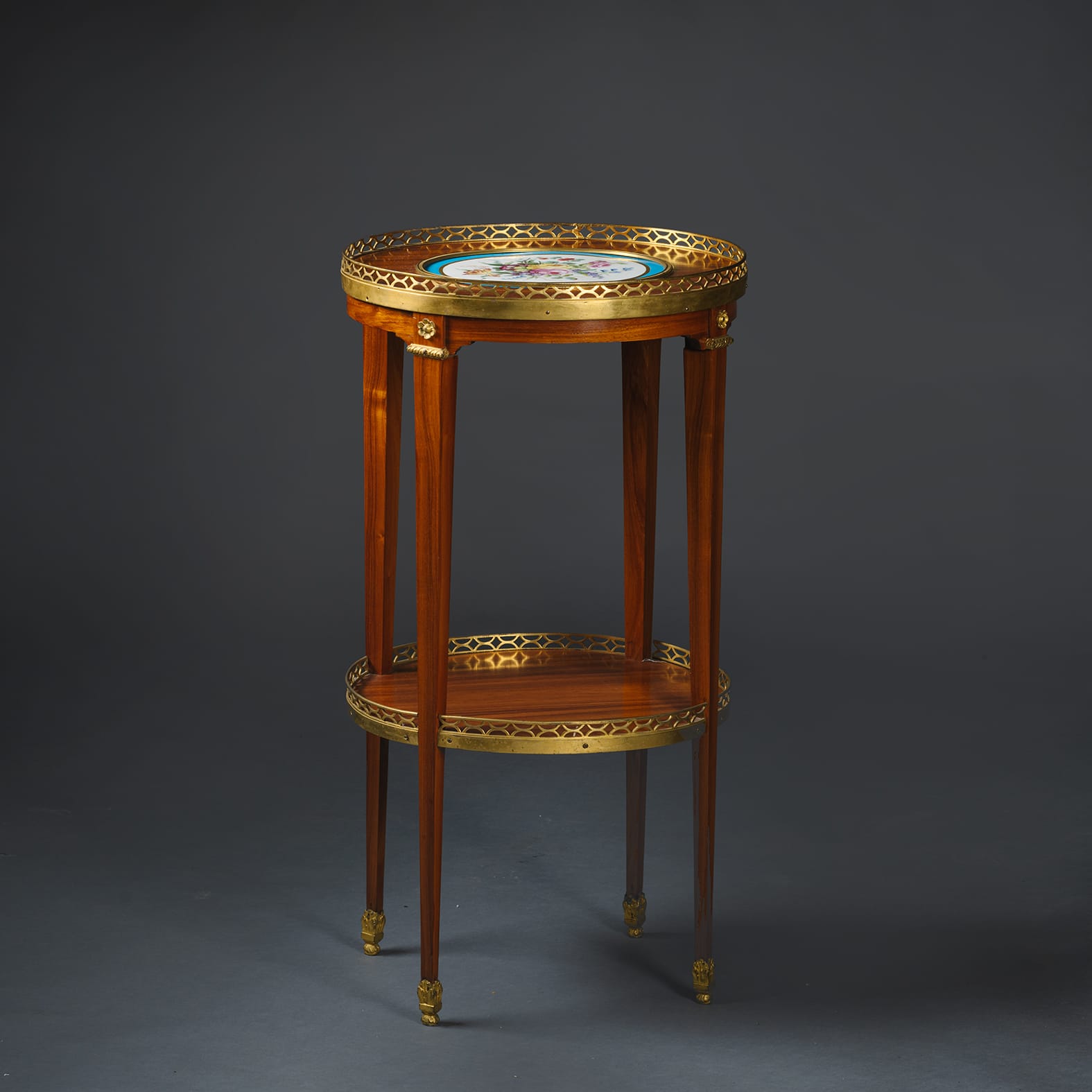 A Louis XVI Style Porcelain Mounted Gueridon