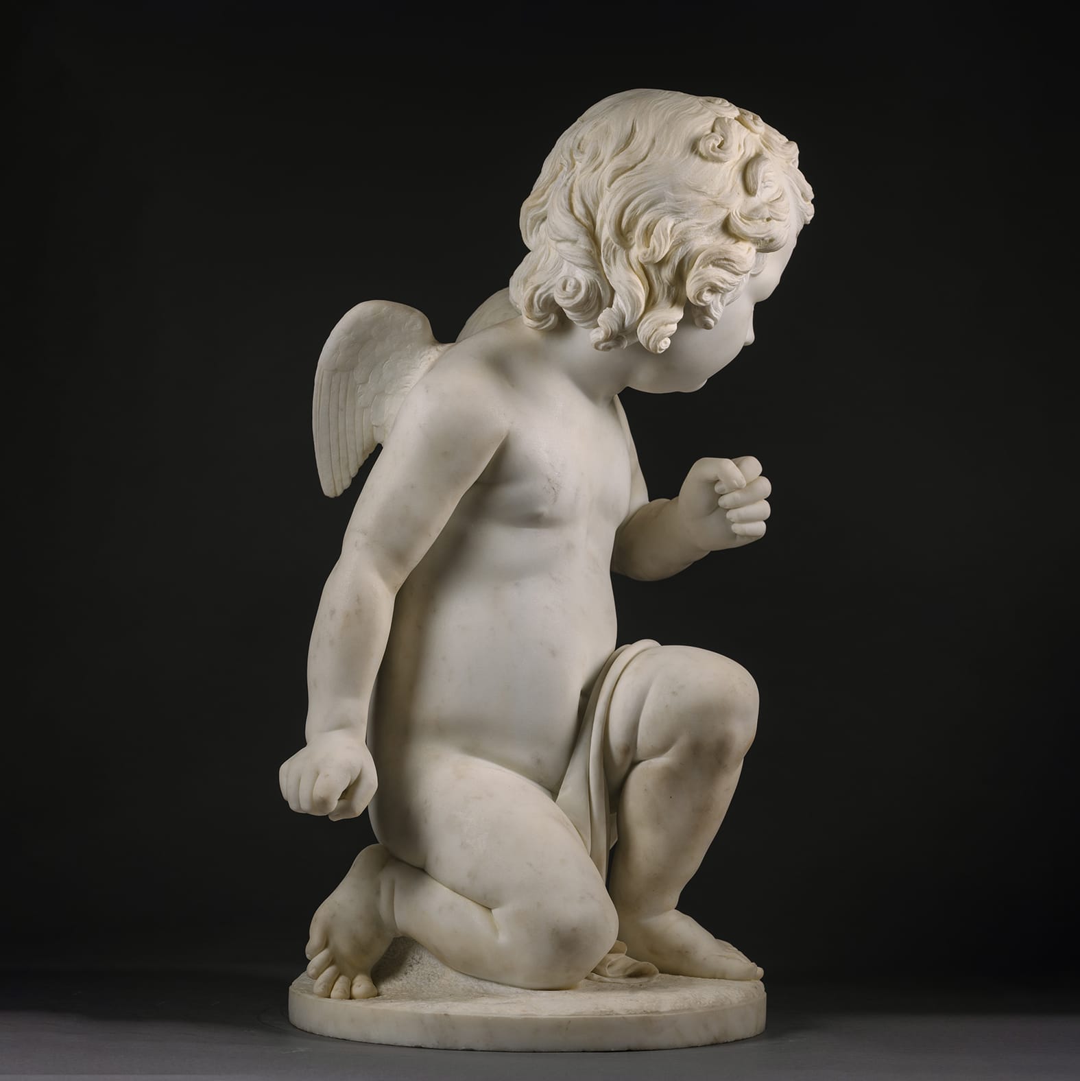 A Fine White Marble Figure of a Kneeling Cherub - Image 3