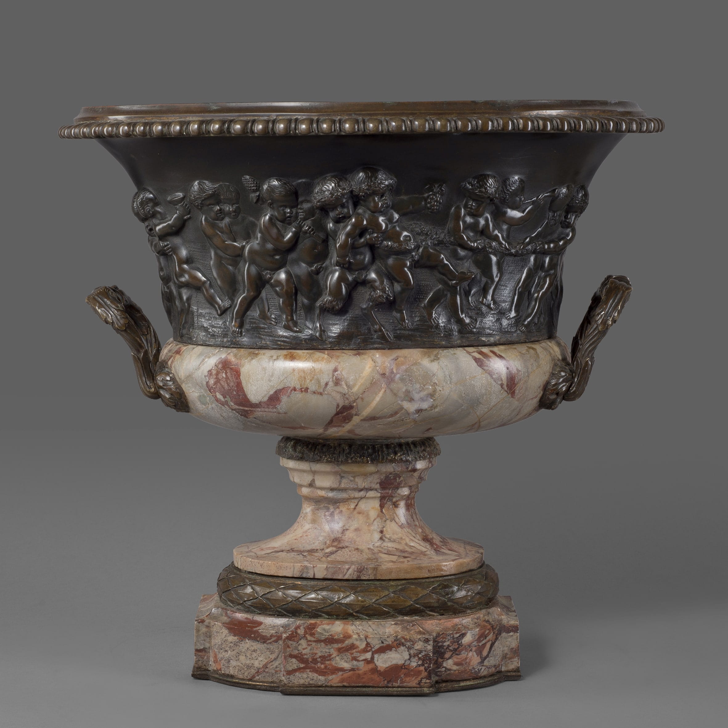 A Louis XVI Style Patinated Bronze and Marble Jardinière