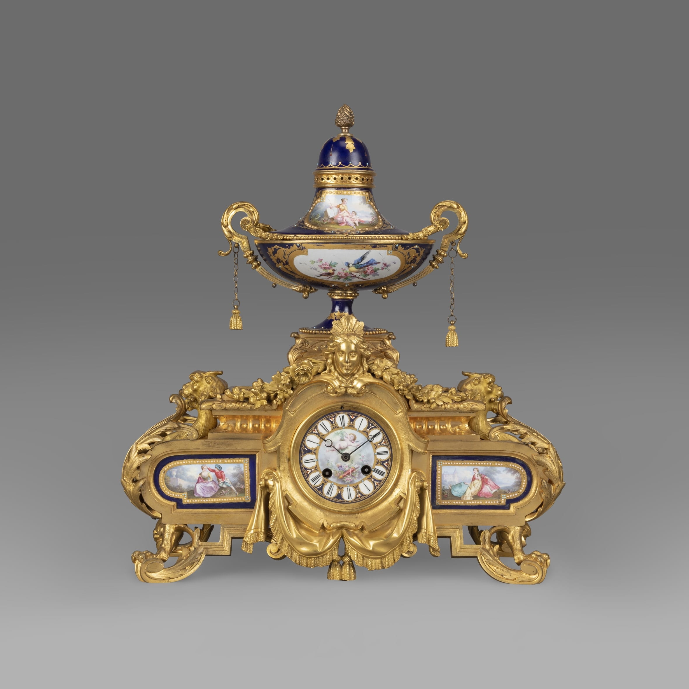 A Napoleon III Porcelain Mounted Clock Garniture - Image 2