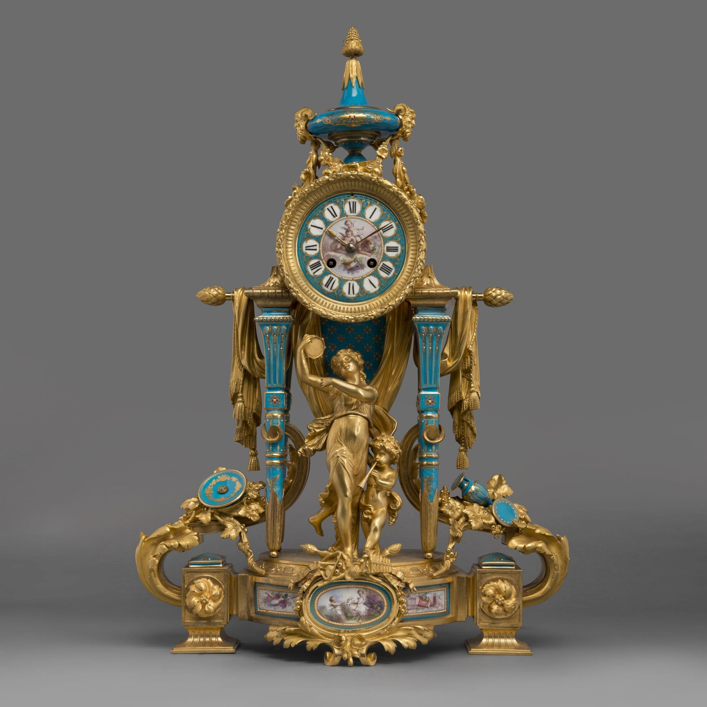 A Fine Gilt-Bronze and Sèvres Style Porcelain Mounted Figural Clock