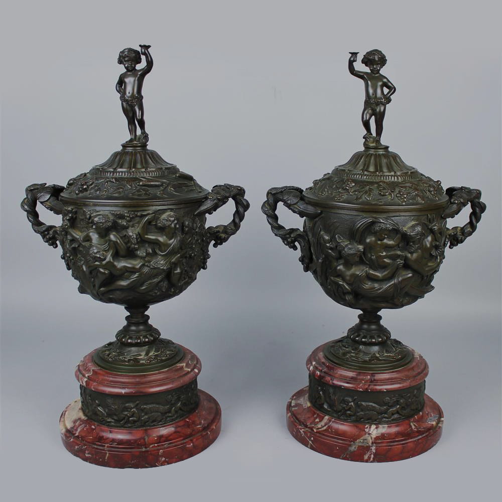 A Pair of Patinated Bronze and Marble Urns and Covers