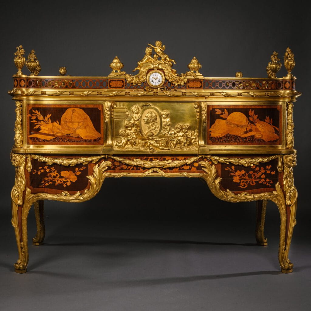 View of the bronze plaque showing Louis XV, on the Bureau du Roi by Maison Beurdeley - collection Adrian Alan