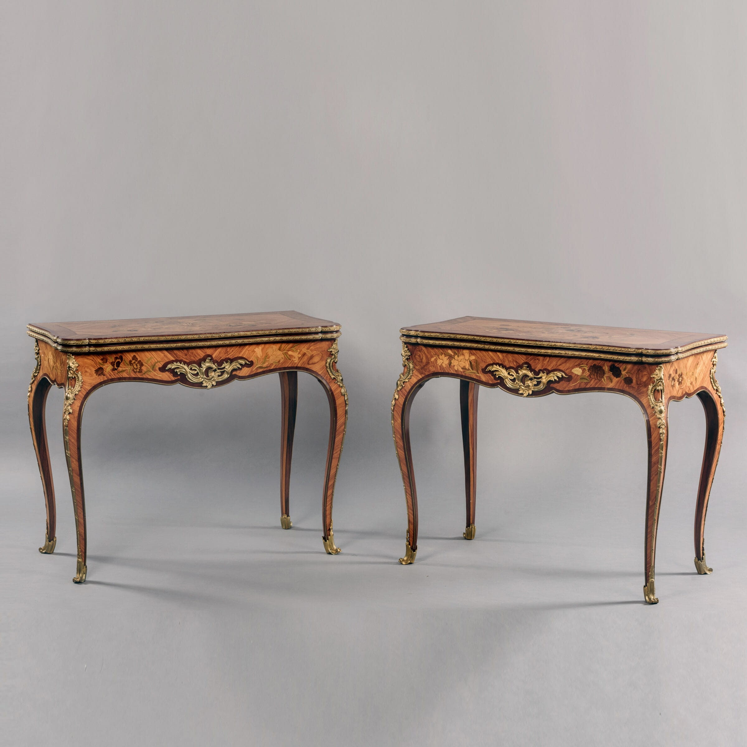 A Fine Pair of Louis XV Style Marquetry Card Tables