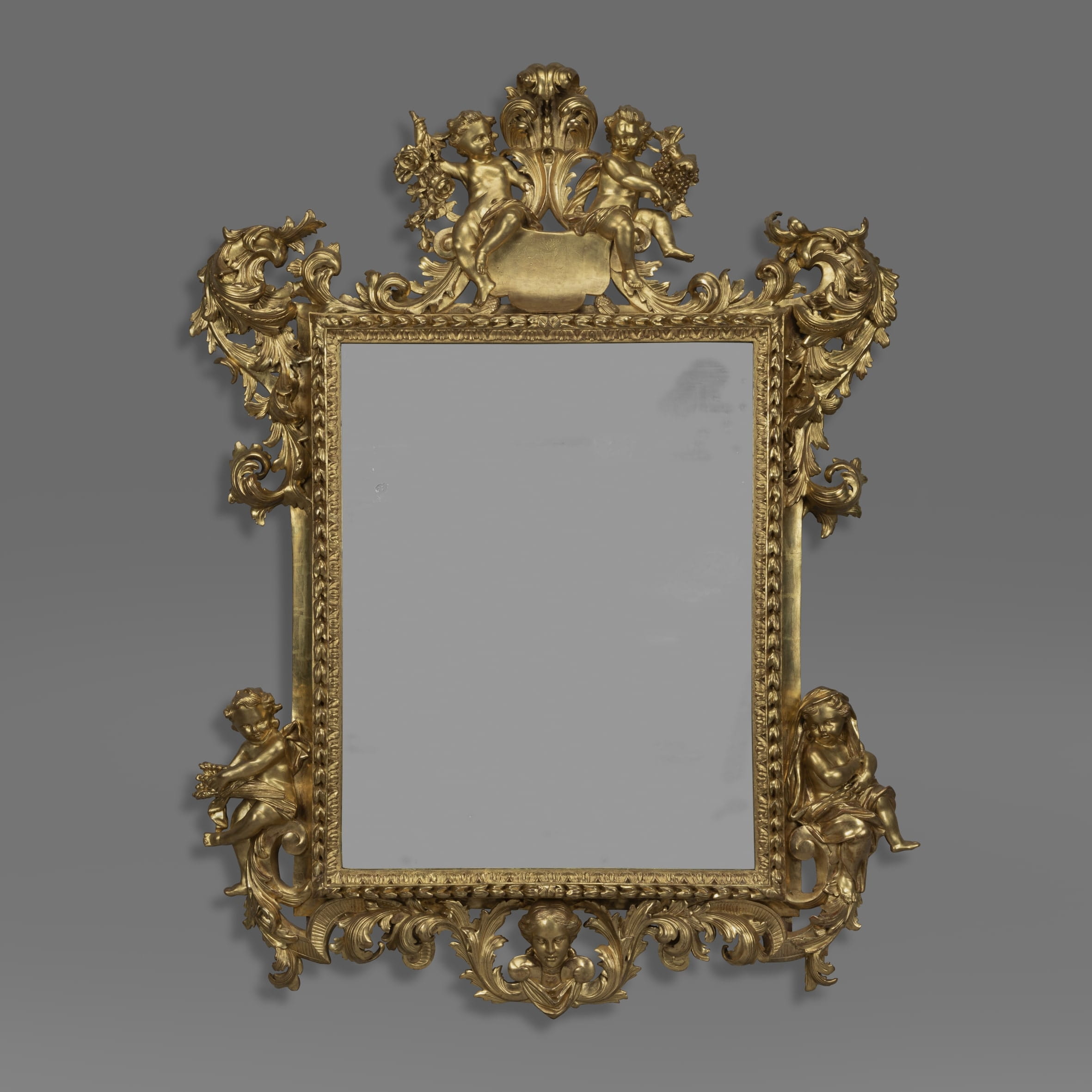 A Fine North Italian Baroque Revival Carved Giltwood Mirror Allegorical of The Seasons