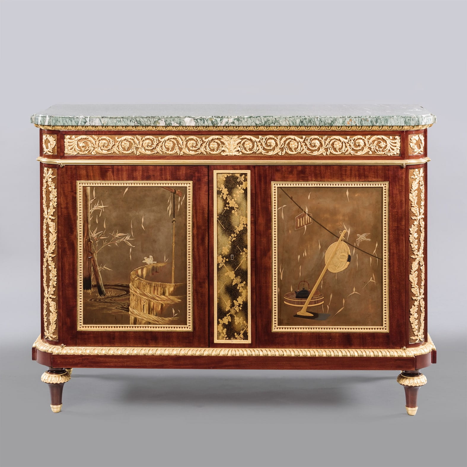 Exceptional antique French commode by Beurdeley, with lacquer-mounted doors, push-button drawer, marble top, and finely chased gilt-bronze mounts, circa 1890.