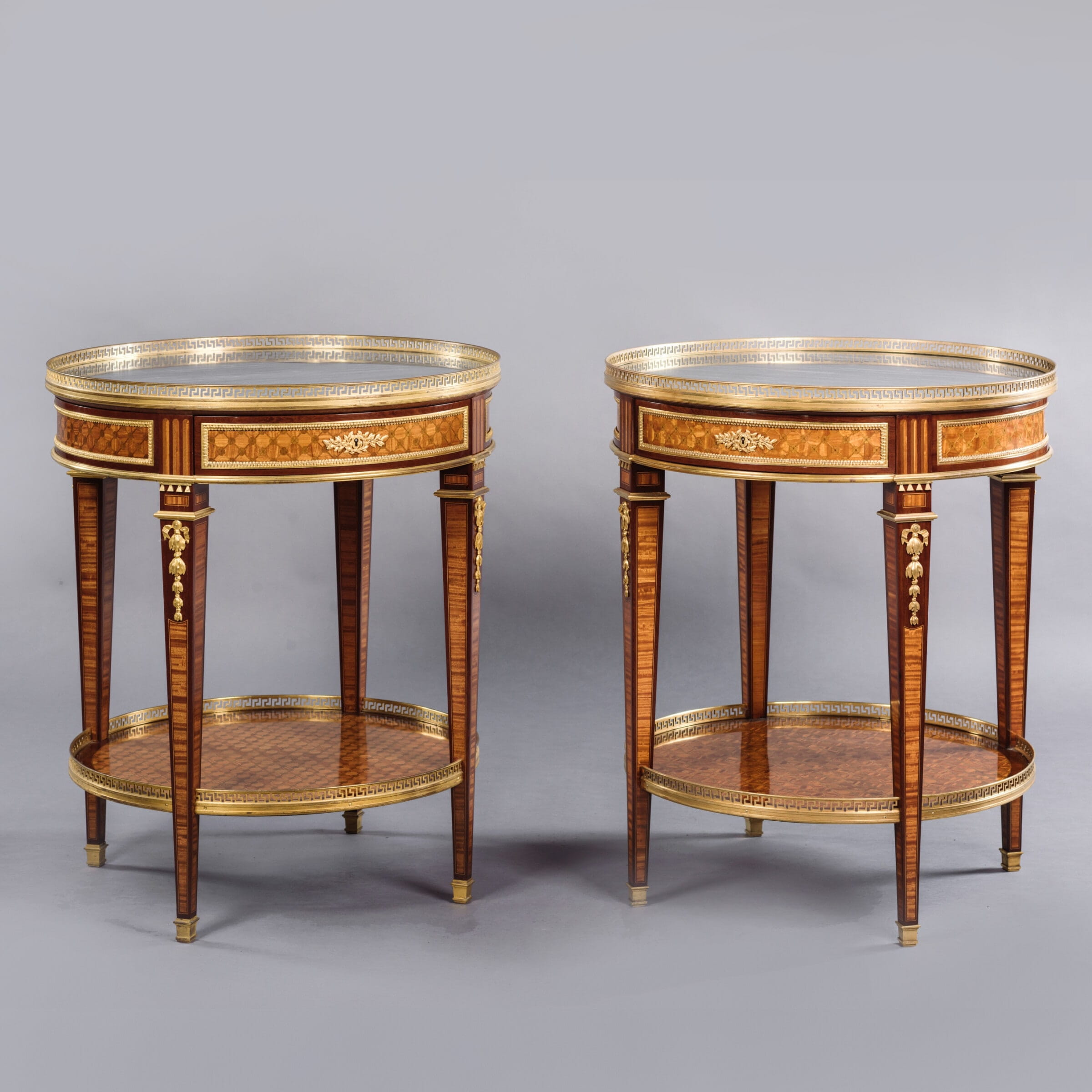A Rare Pair of Louis XVI Style Gilt-Bronze Mounted Parquetry Gueridons