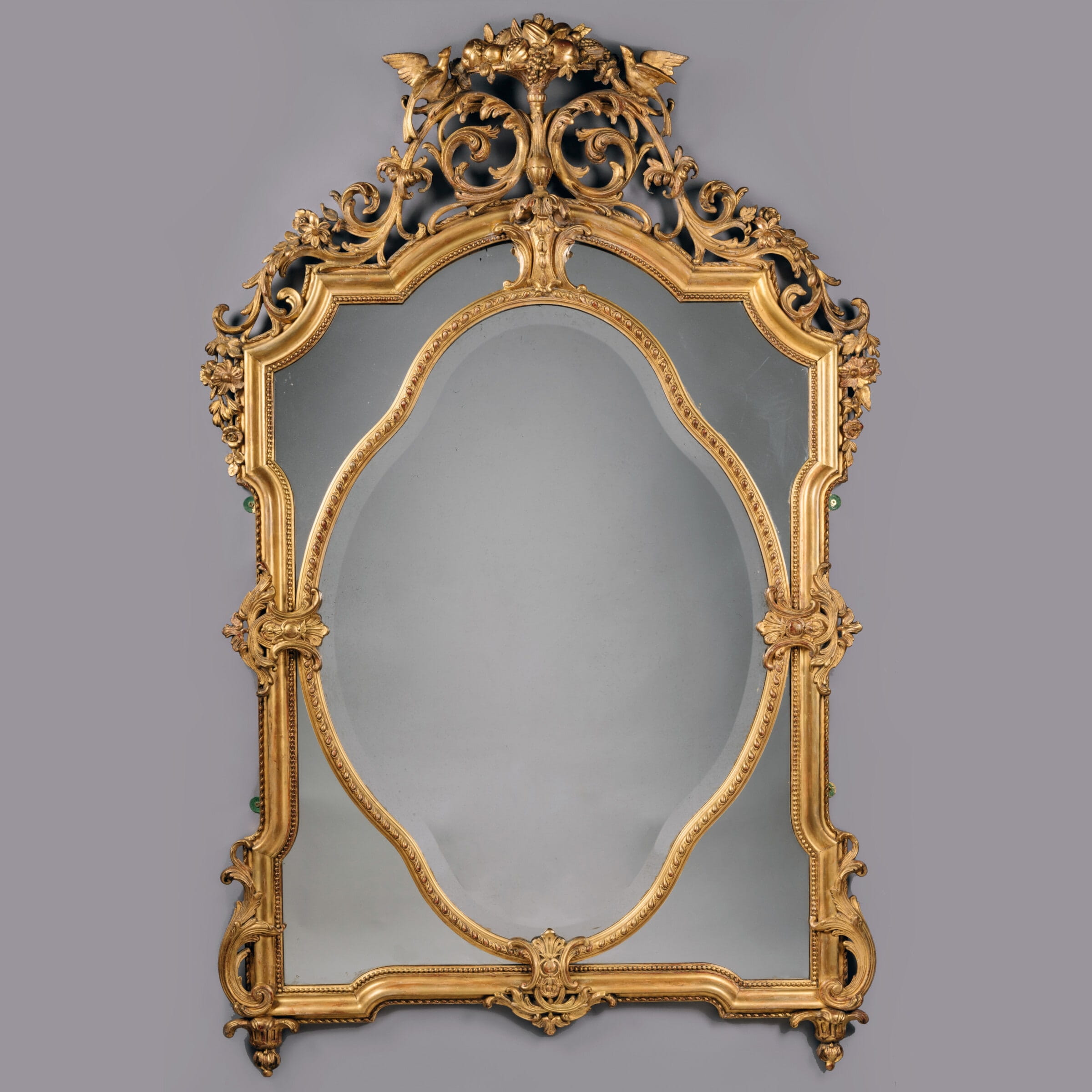 A Fine Louis XVI Style Carved Giltwood and Gesso Mirror