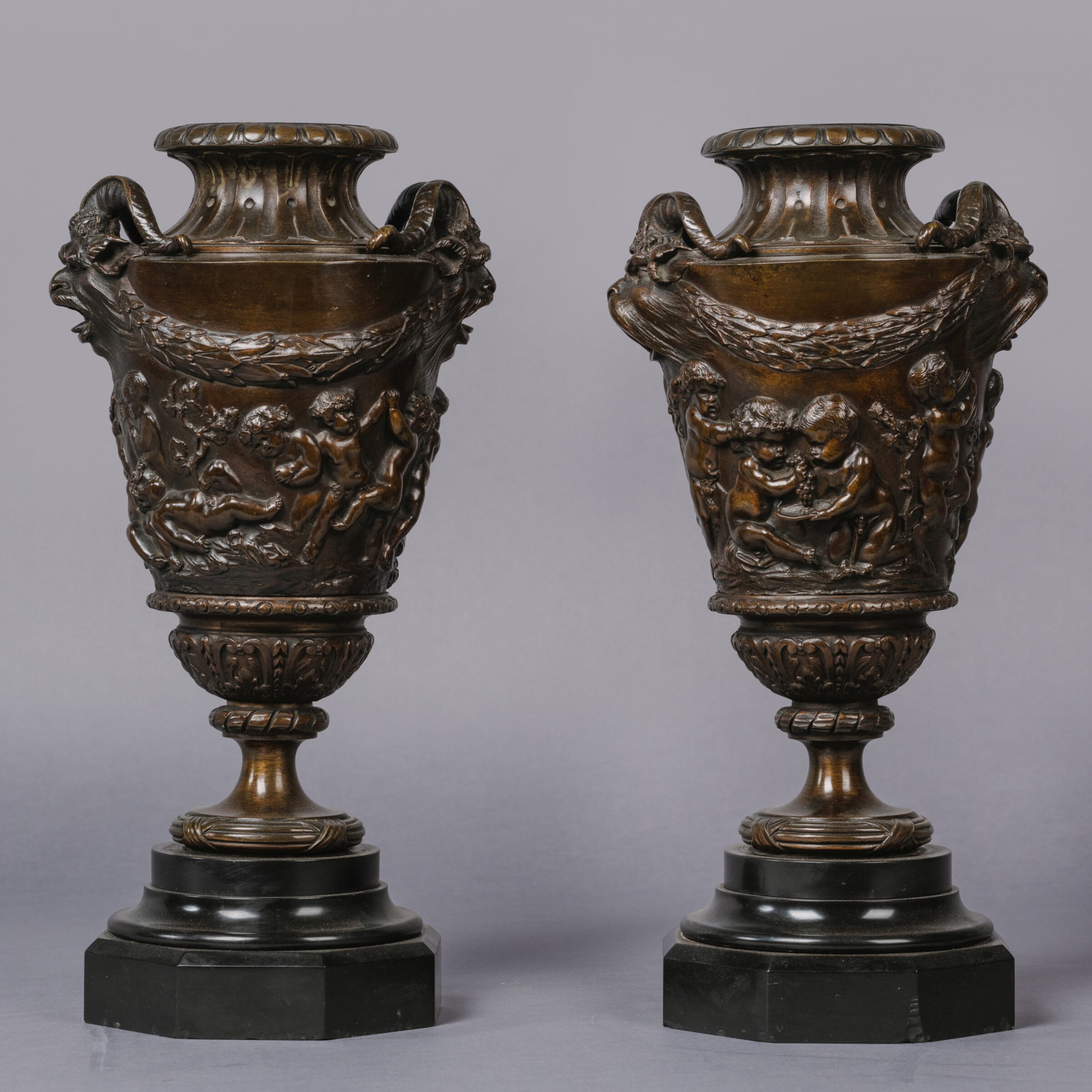 A Fine Pair of Patinated Bronze Bacchanalian Vases