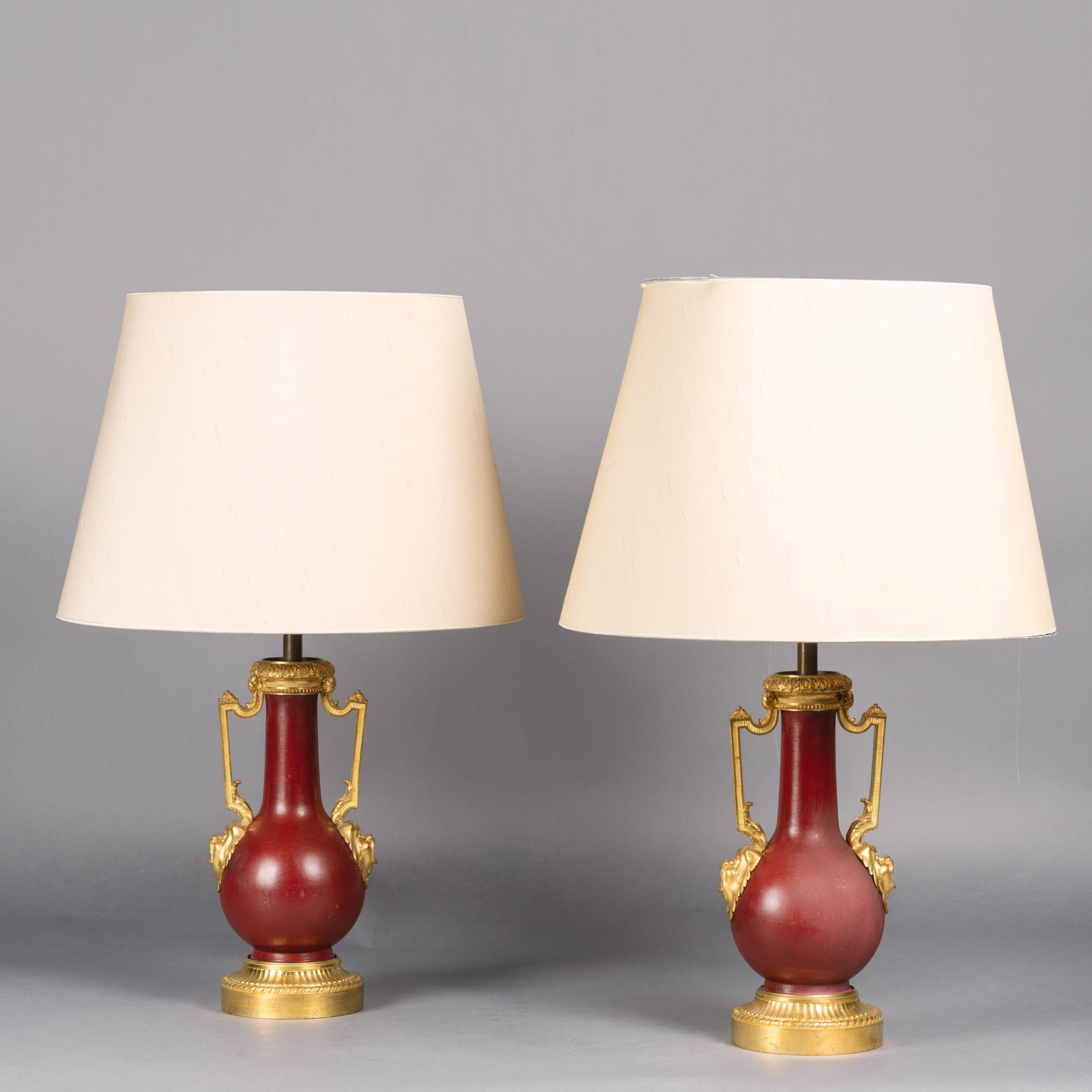 A Pair of Gilt-Bronze Mounted Red Lacquer Vases, Adapted as Table Lamps