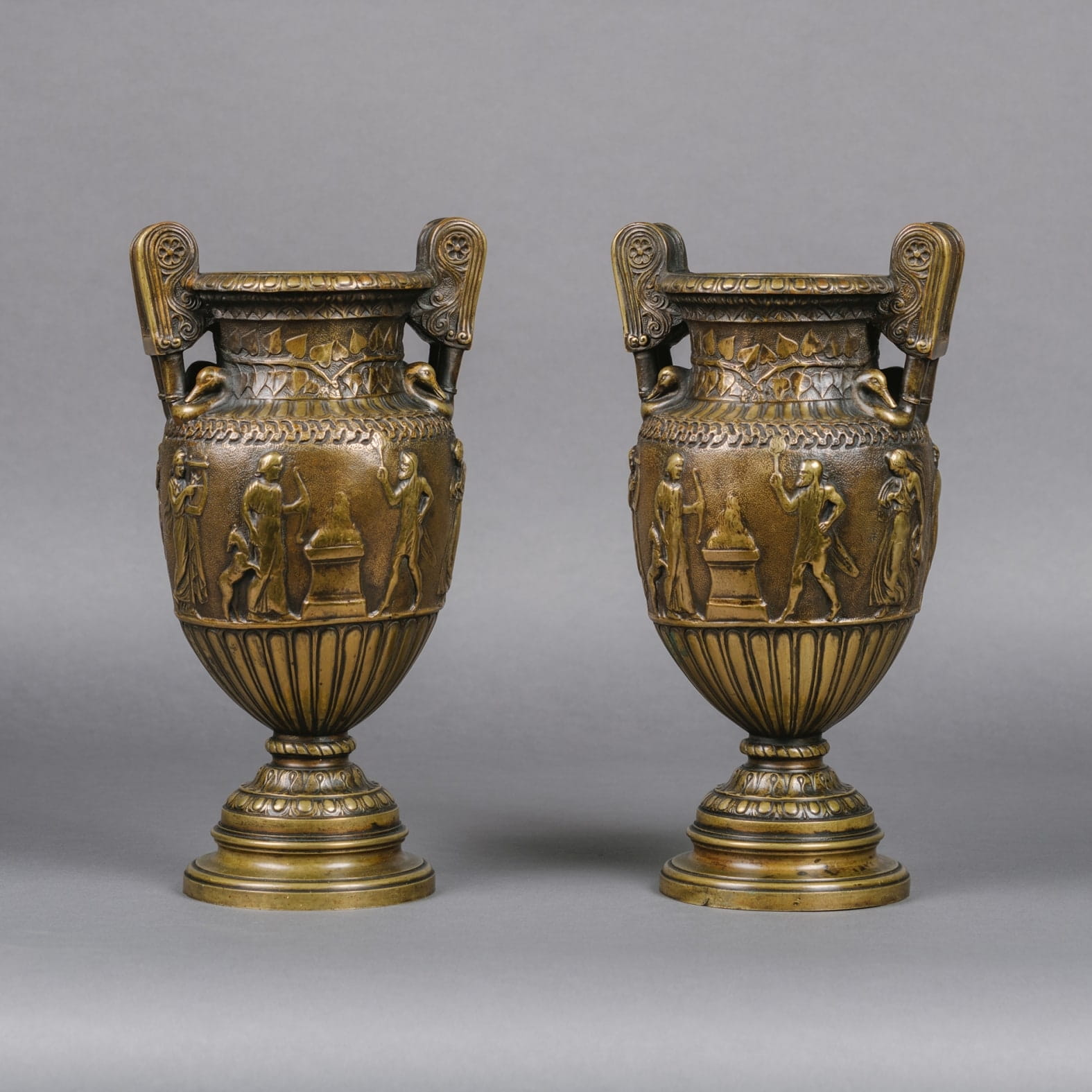 A Pair of Patinated Bronze Vases Cast After the Antique