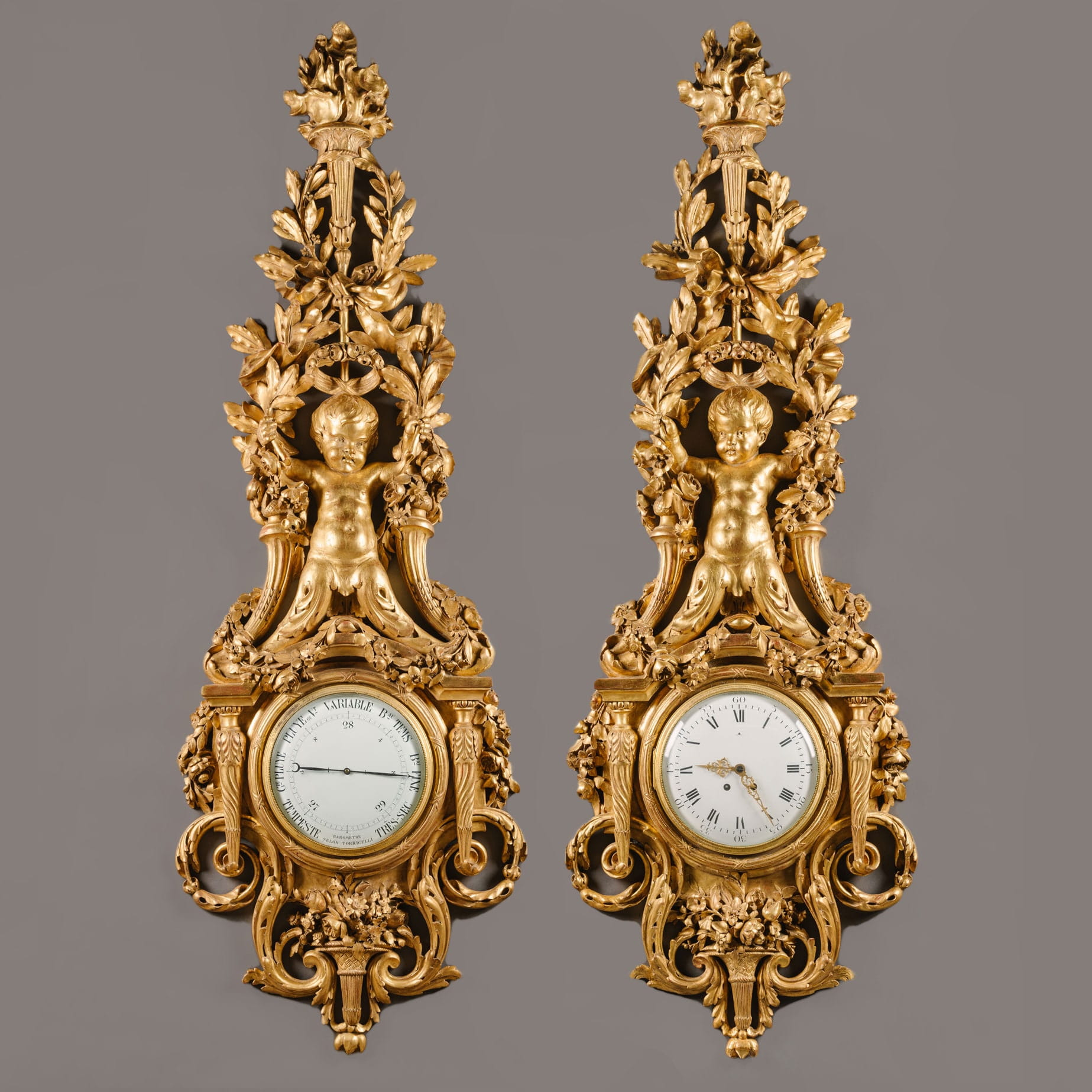 A Large Louis XVI Style Carved Giltwood Clock and Barometer Set