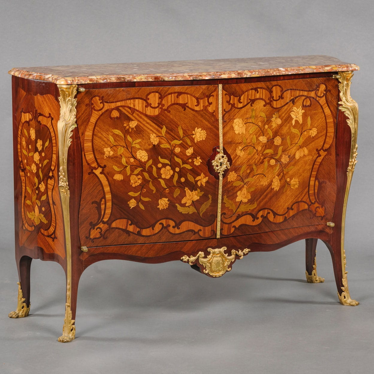 A Fine Louis XV Style Gilt-Bronze Mounted Marquetry Inlaid Commode