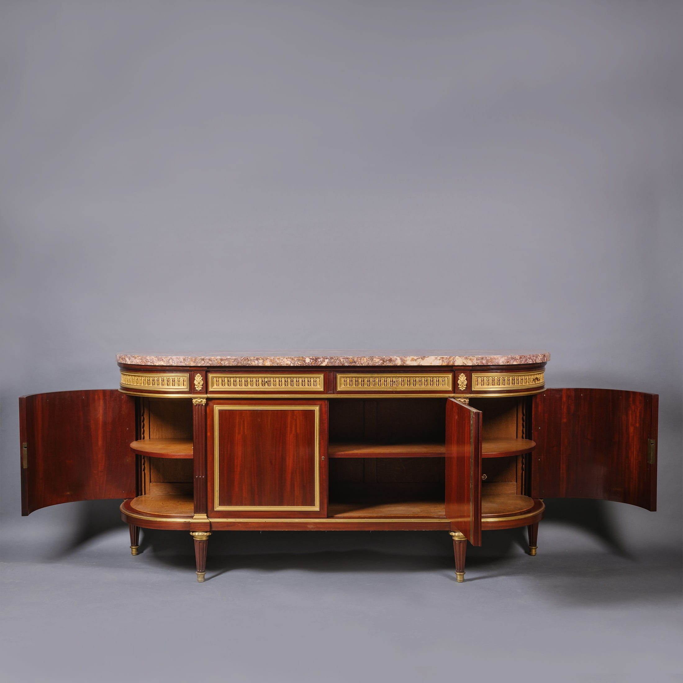 A Fine Louis XVI Style Gilt-Bronze Mounted Mahogany Dining Suite - Image 9
