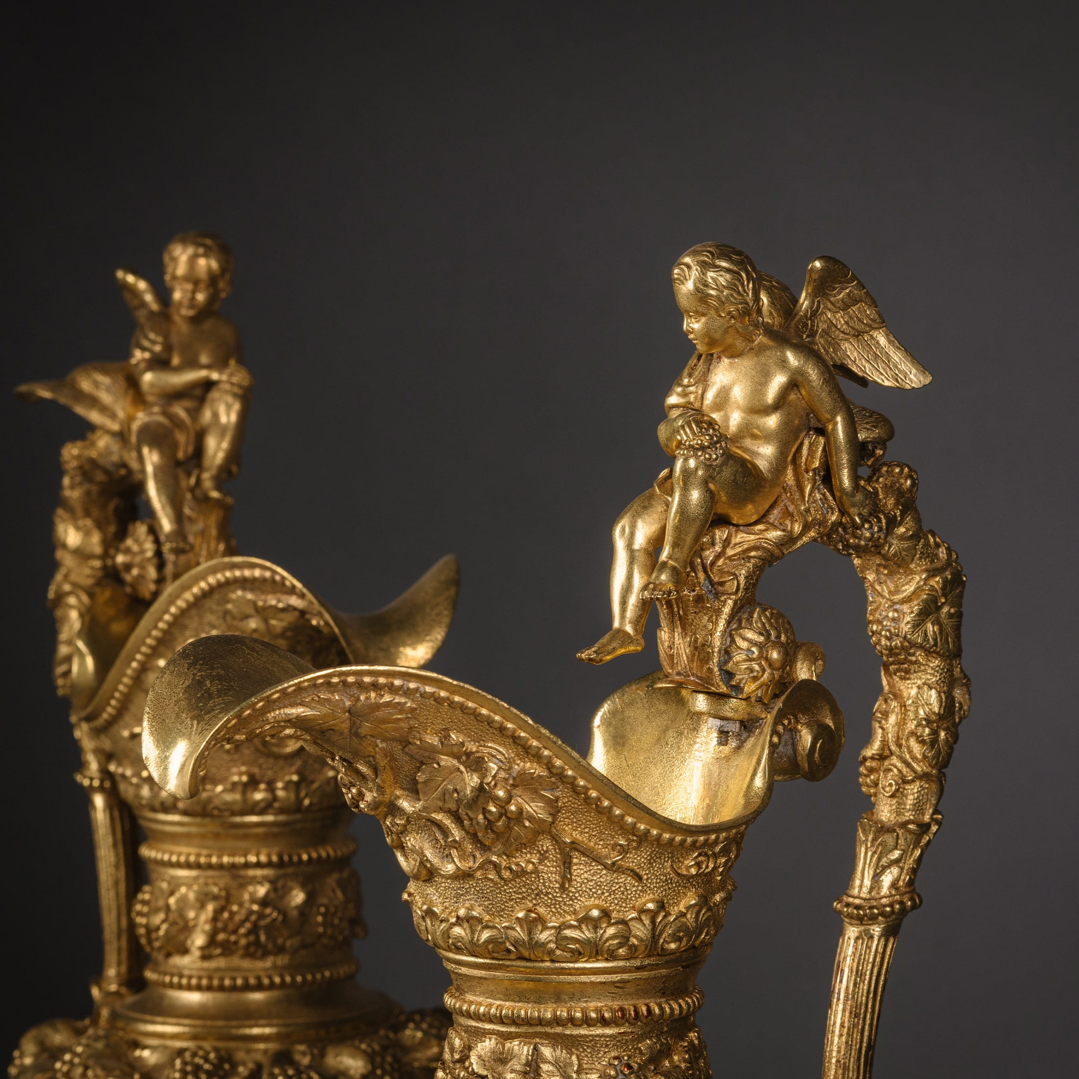 A Pair of Gilt and Patinated Bronze Ewers in the Manner of Clodion - Image 3