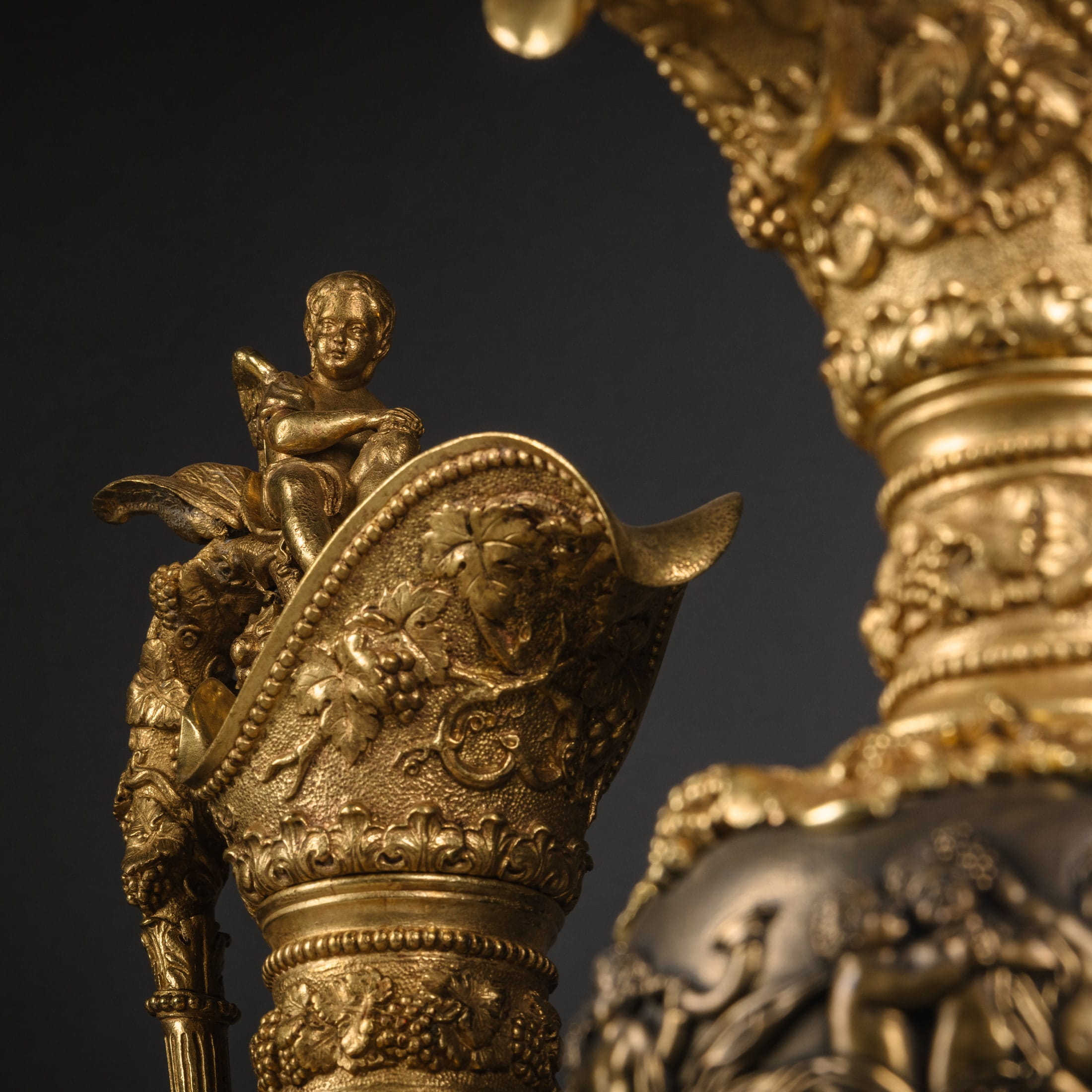 A Pair of Gilt and Patinated Bronze Ewers in the Manner of Clodion - Image 4