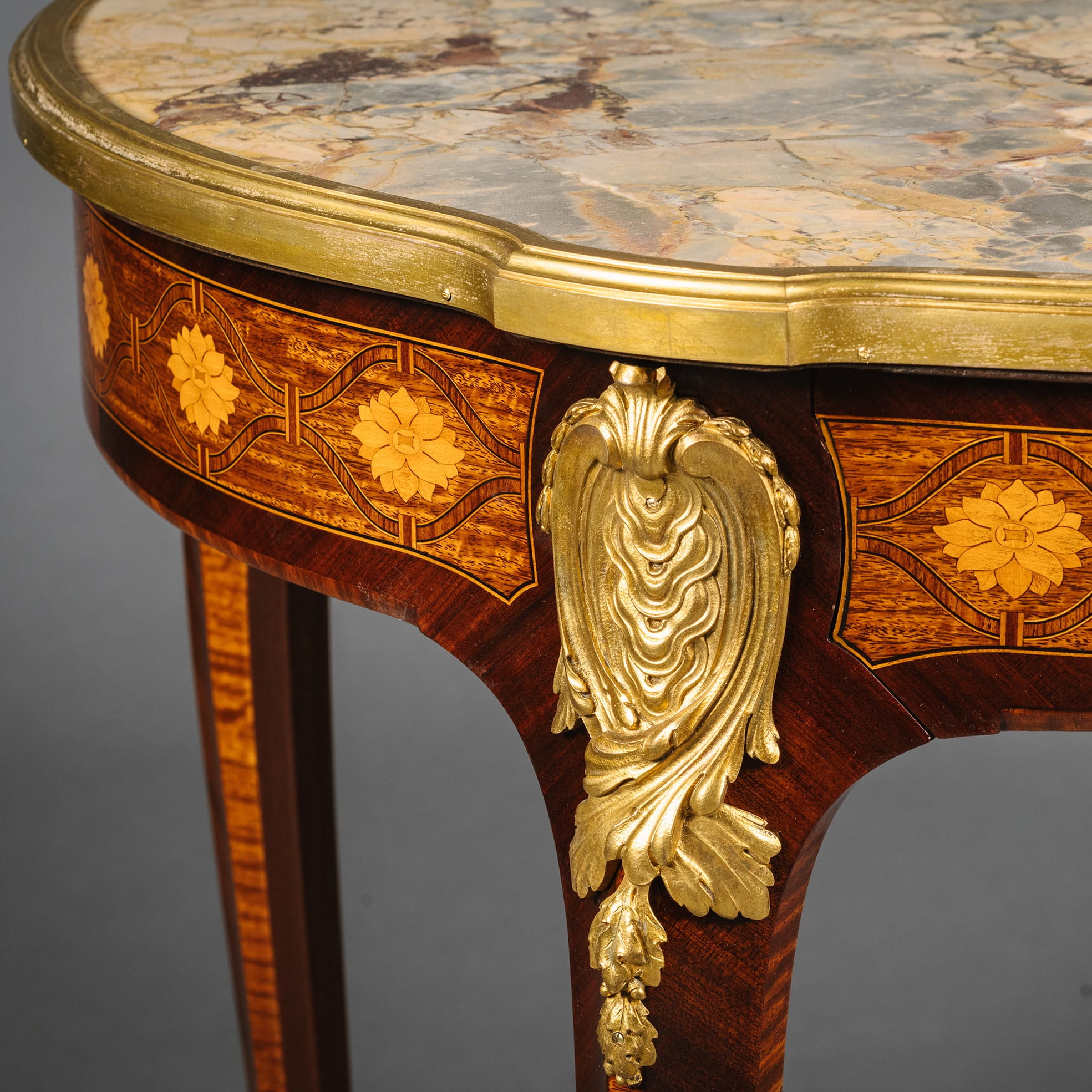 A Louis XV Style Gilt-Bronze Mounted Mahogany and Parquetry Occasional Table - Image 4
