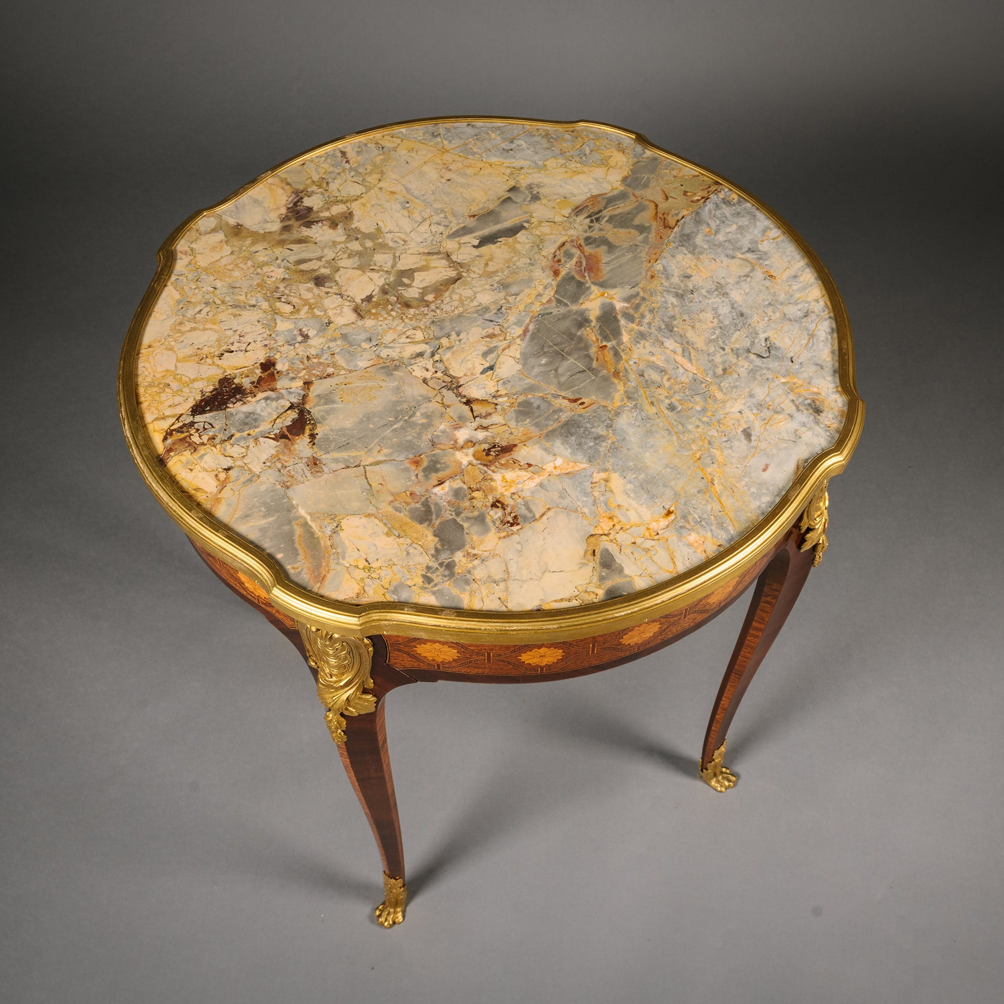 A Louis XV Style Gilt-Bronze Mounted Mahogany and Parquetry Occasional Table - Image 3