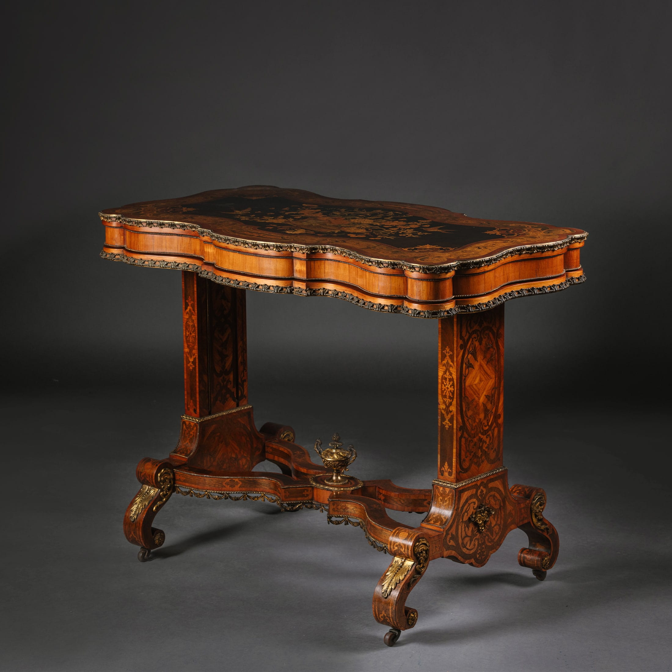 A Rare And Unusual Victorian Gilt-Bronze and Marquetry Metamorphic Table