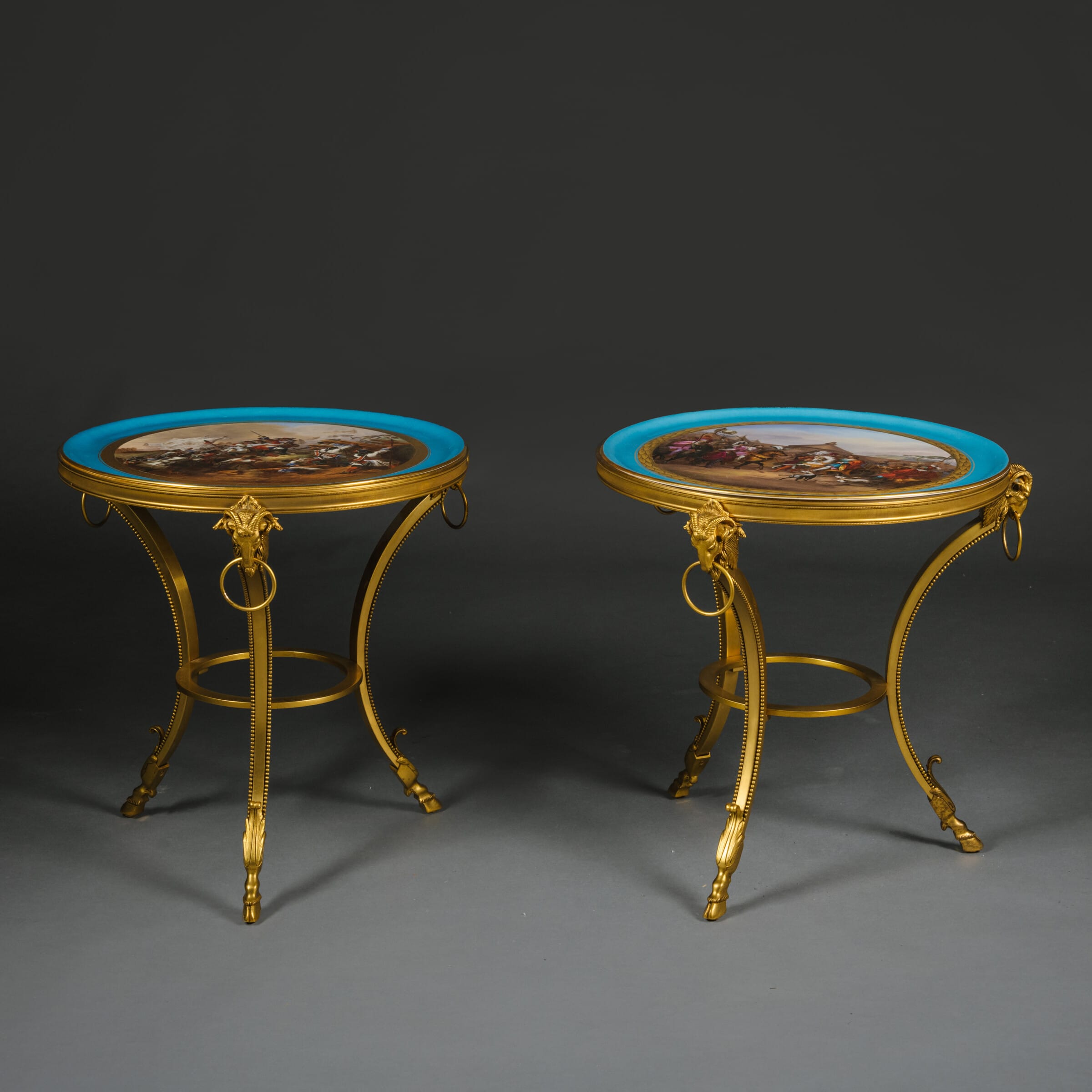 An Unusual Pair of Louis XVI Style Gilt-Bronze Low Side Tables With Sèvres-Style Porcelain Tops