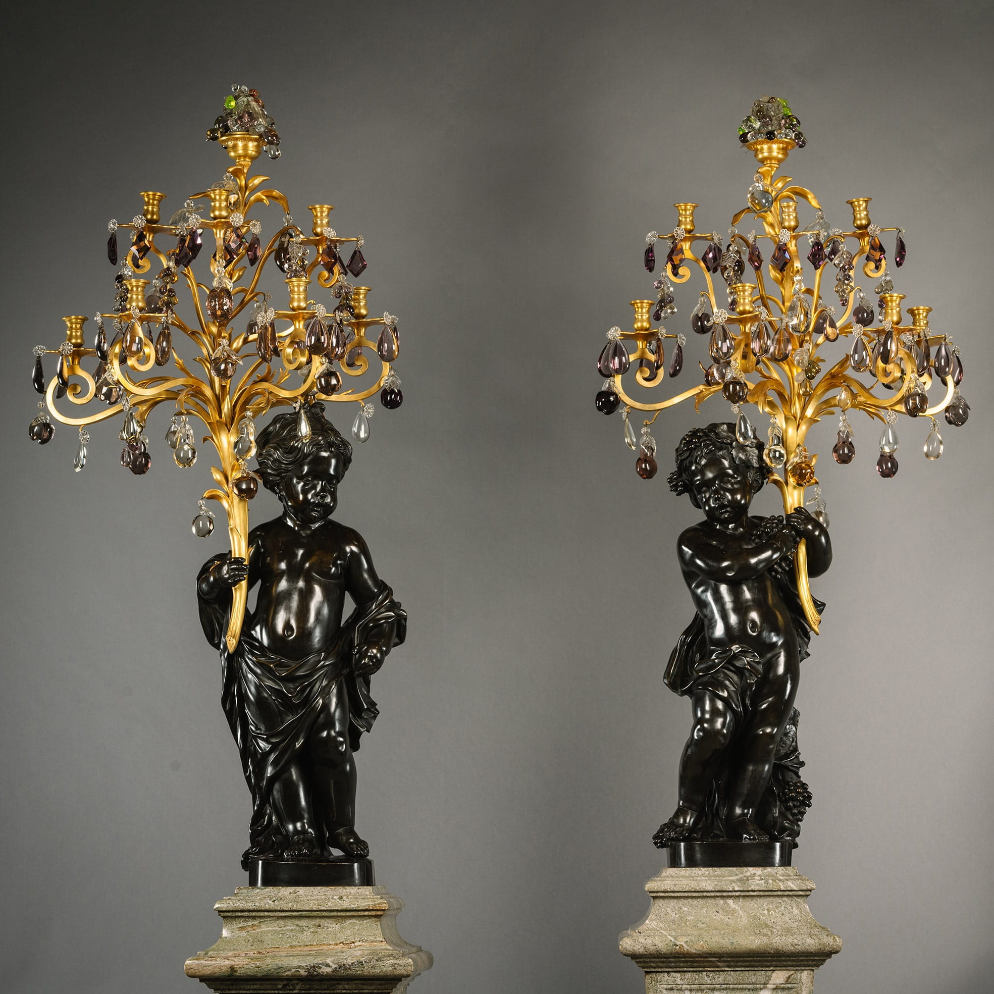 A Pair of Palatial Patinated Bronze Figural Candelabra, On Green Marble Pedestals - Image 2