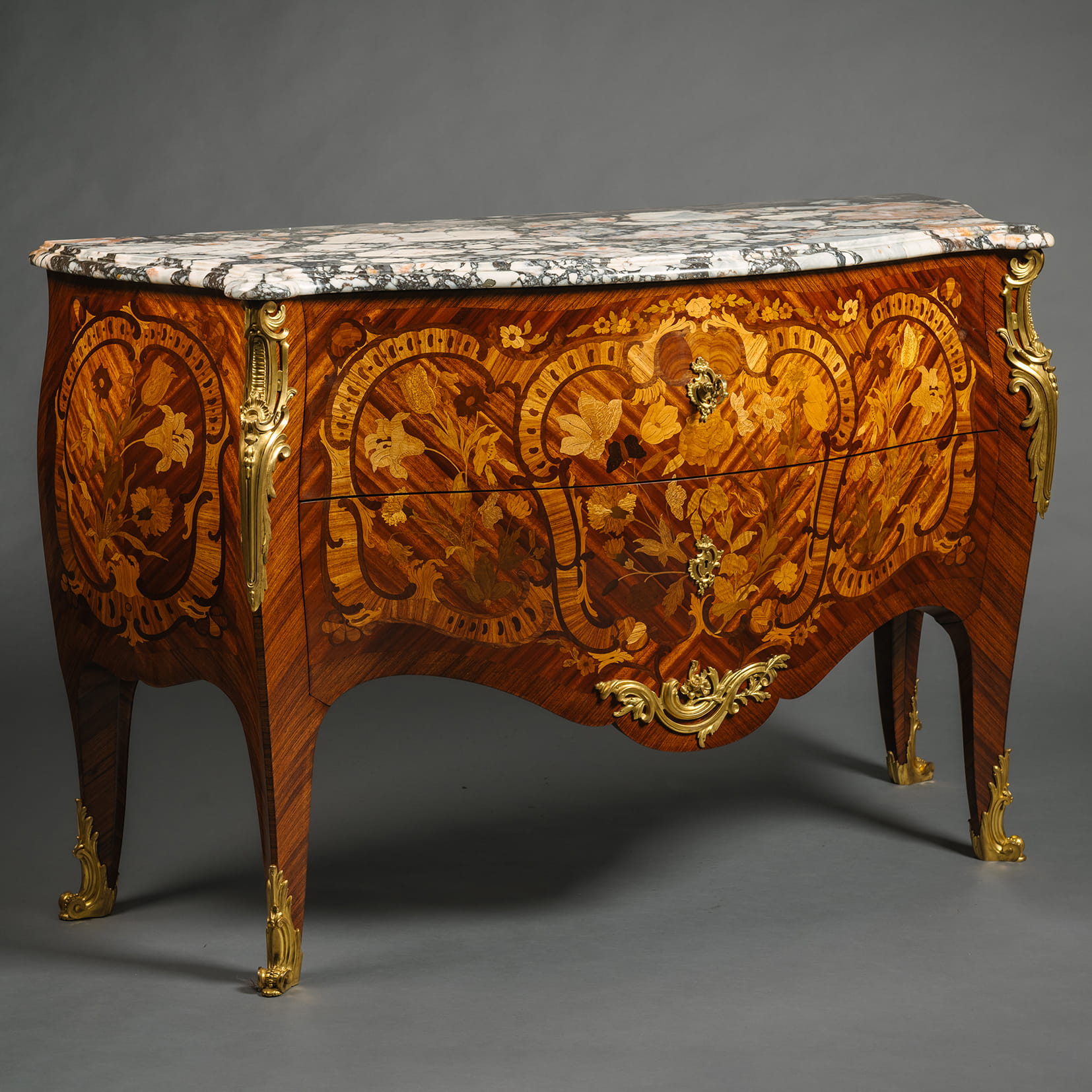 A Fine Louis XV Style Gilt-Bronze Mounted Marquetry Commode
