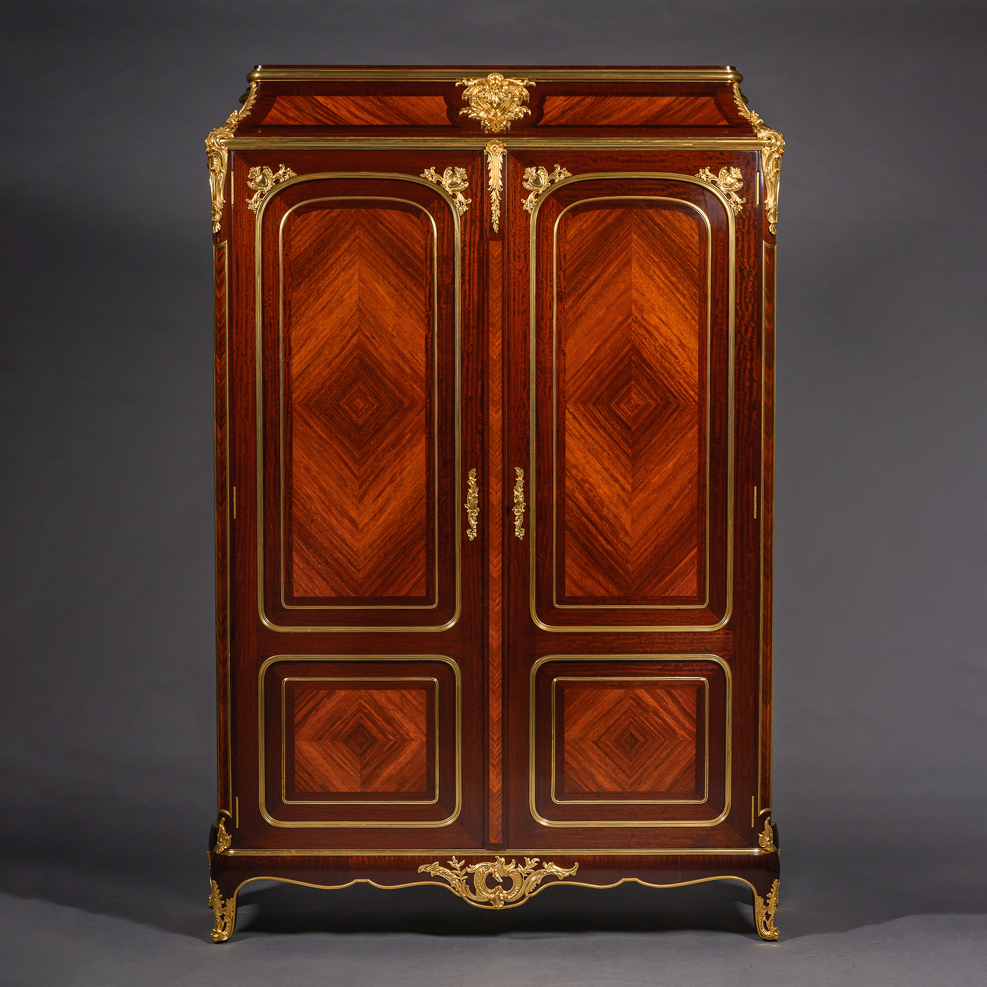 French gilt-bronze mounted mahogany armoire, circa 1880, by Gervais-Maximilien-Eugène Durand.