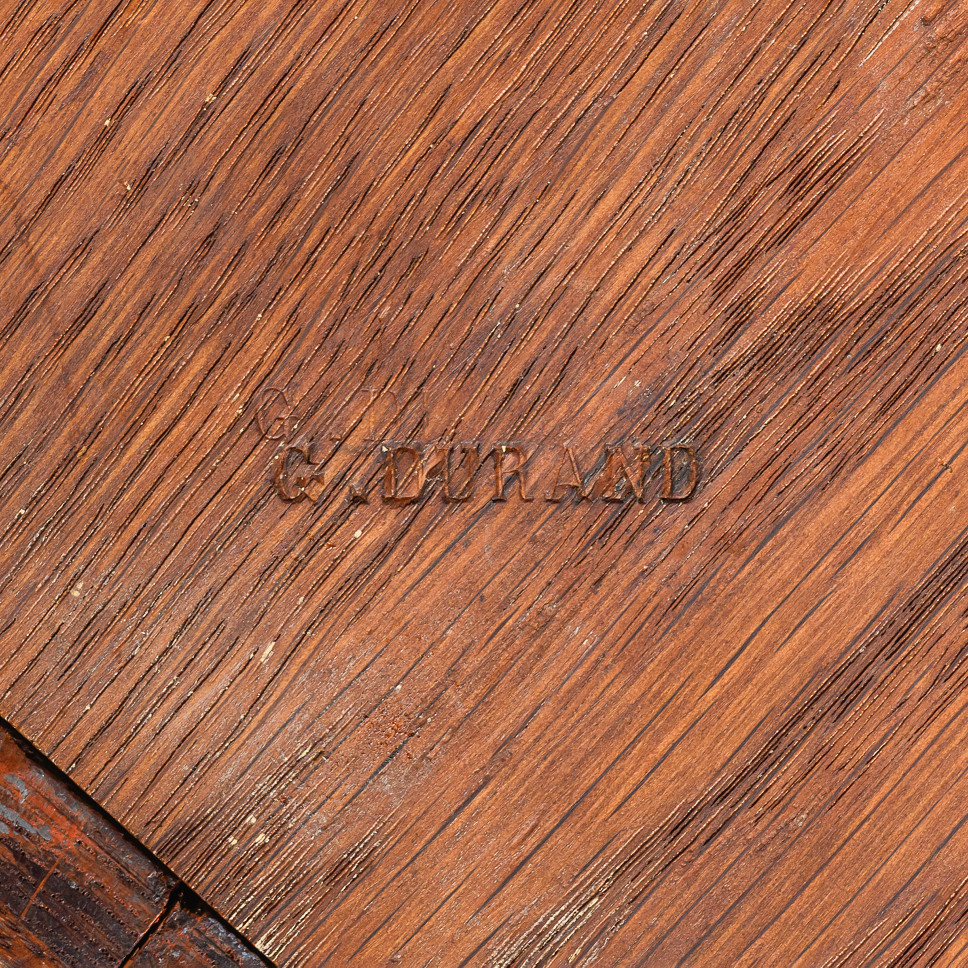 Stamped ‘G. DURAND’ maker’s mark on the reverse of a French Régence style armoire.