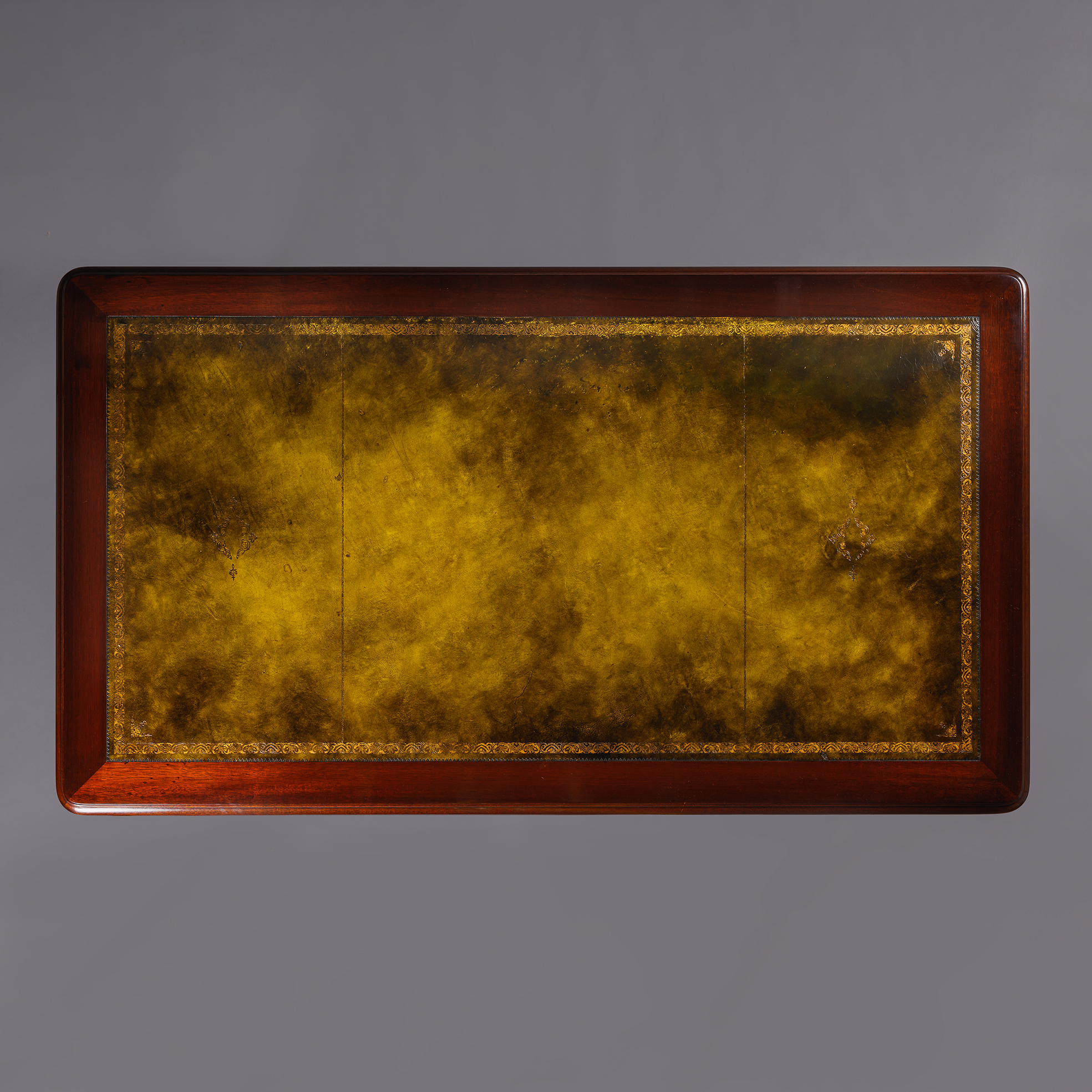 Original gilt-tooled green leather writing surface