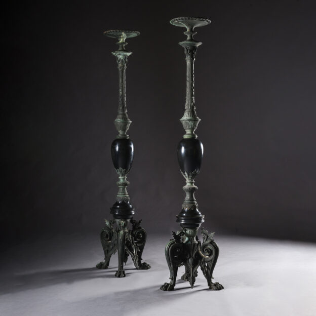 Pair of Napoleon III Neo-Grec bronze and black marble torchères
