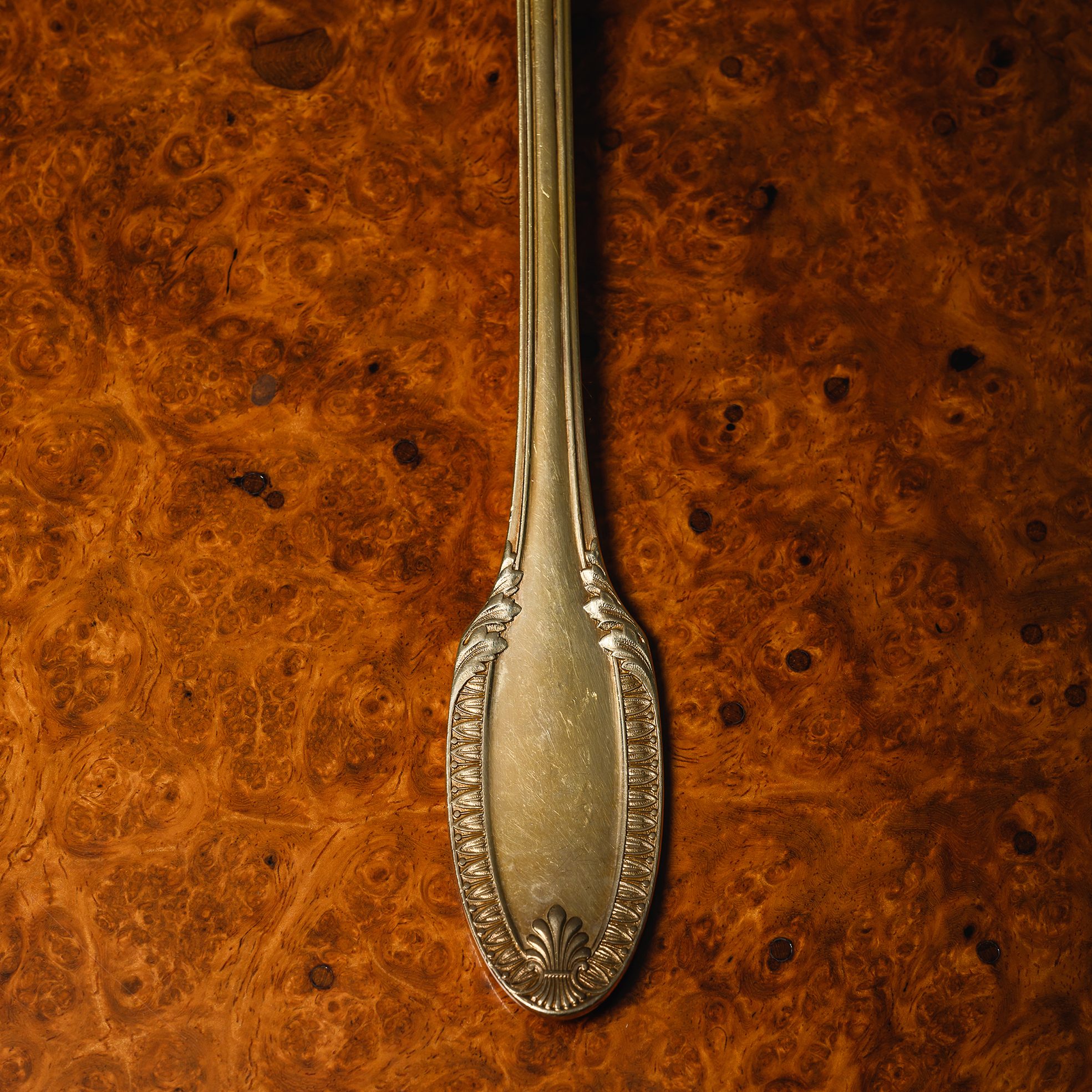 Detail of the handle of a Puiforcat Percier Pattern Silver-Gilt Table Spoon