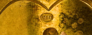 HD maker's mark stamped into a Henry Dasson gilt-bronze mount
