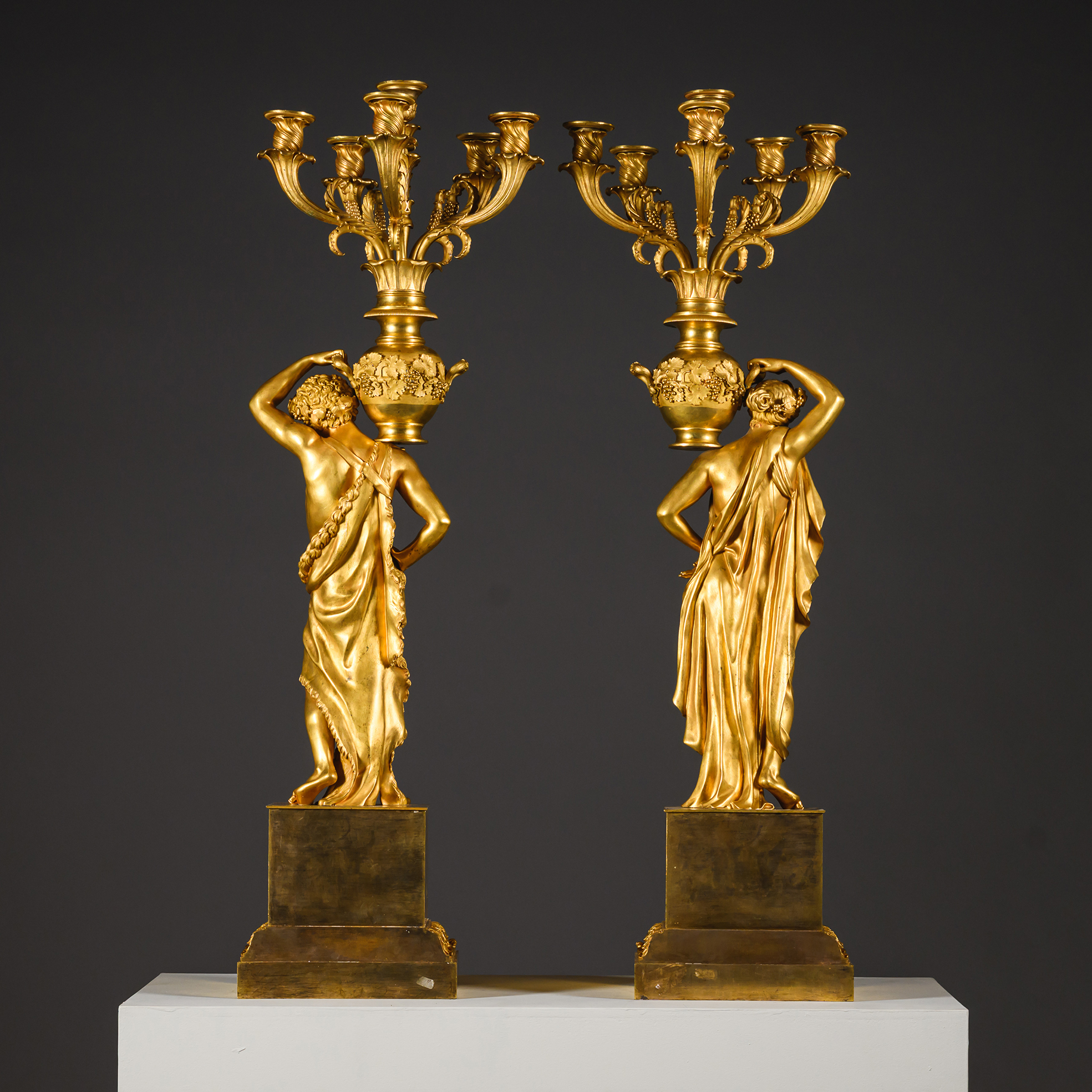 rear view of A Pair of French Neoclassical Figural Candelabra in Gilt Bronze
