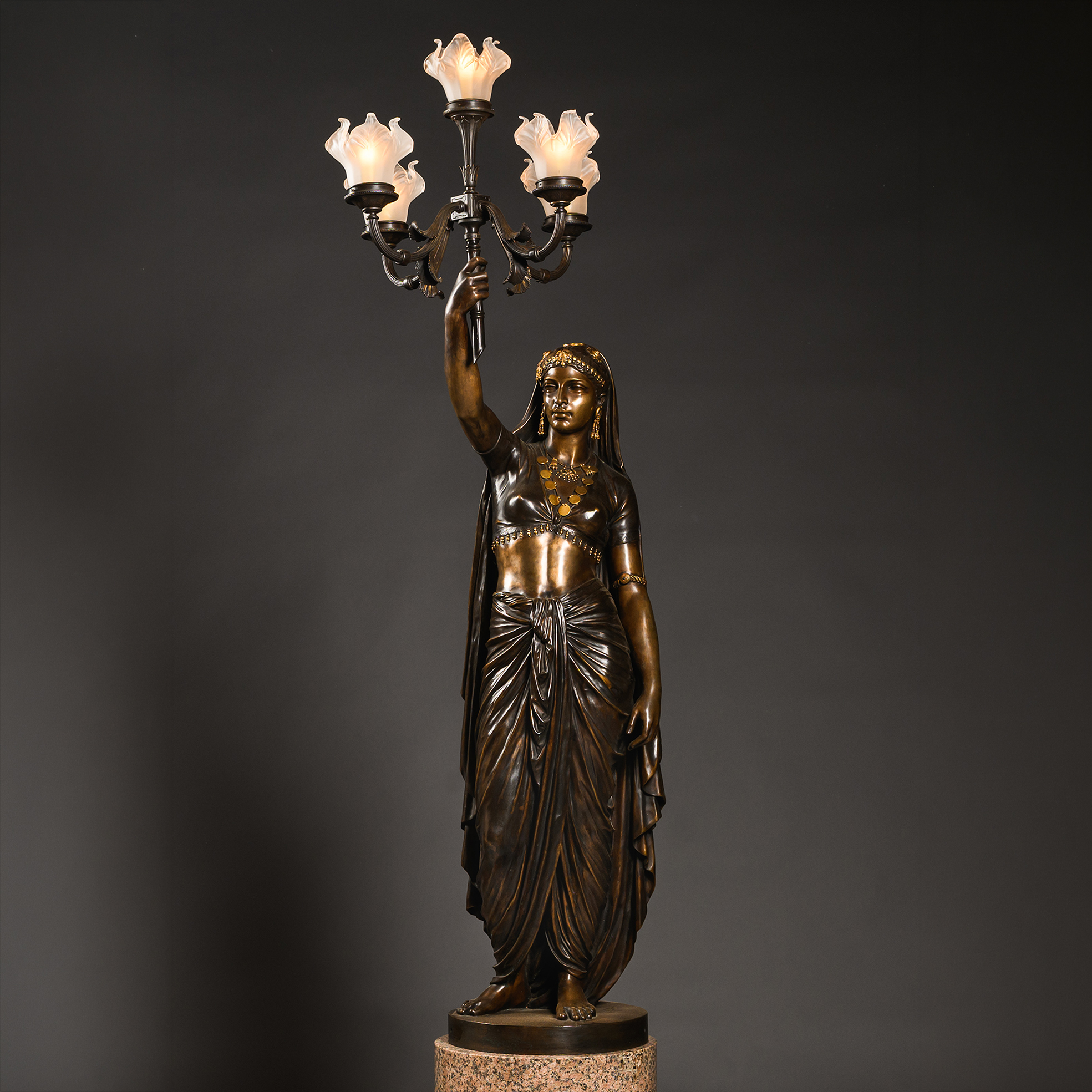 Orientalist female figure in Émile Guillemin’s ‘Femme Indienne’, displaying the sculptor’s elaborate modelling and coloured bronze patination.