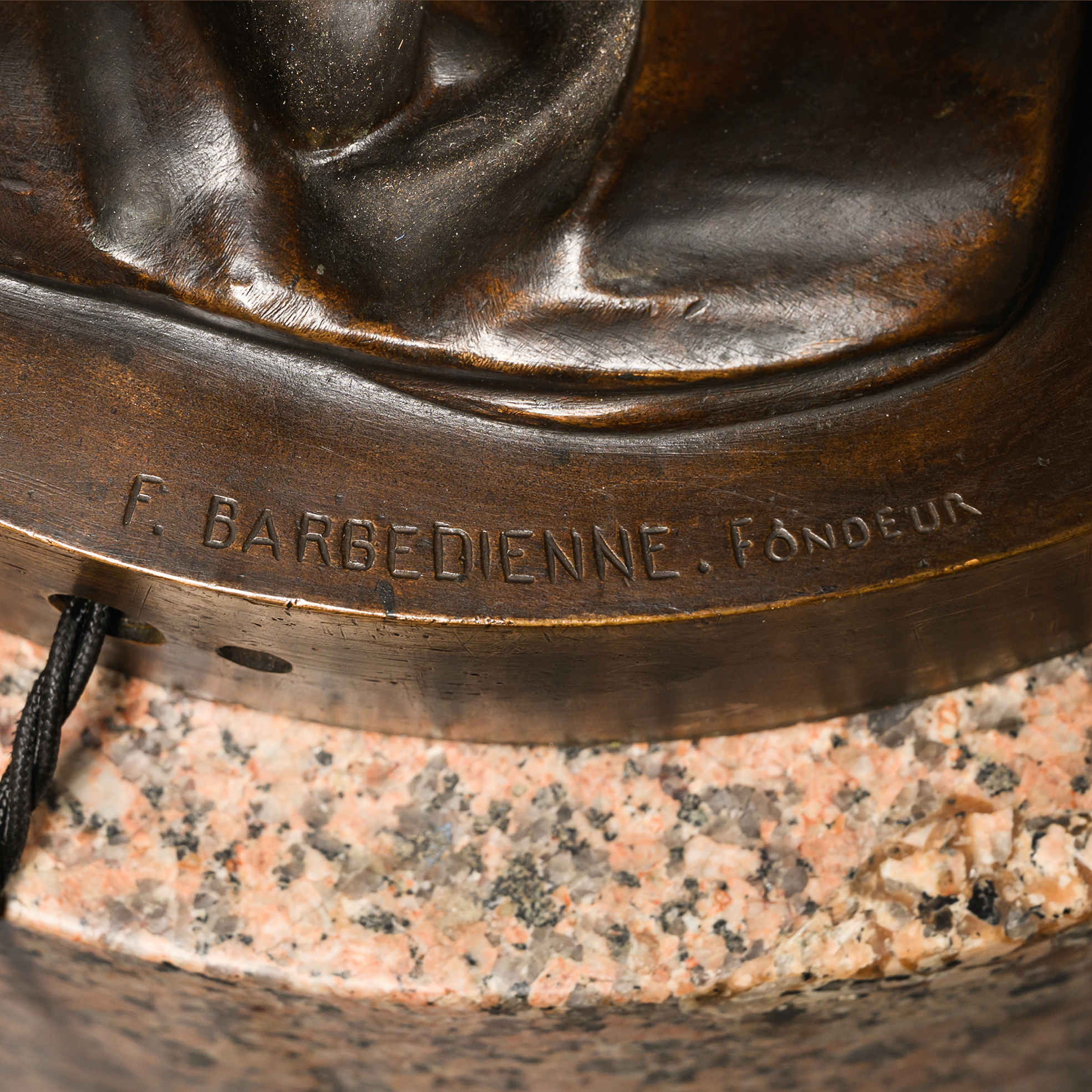 Detail of the inscription ‘F. BARBEDIENNE FONDEUR’, identifying the Parisian bronze foundry responsible for casting the sculpture.