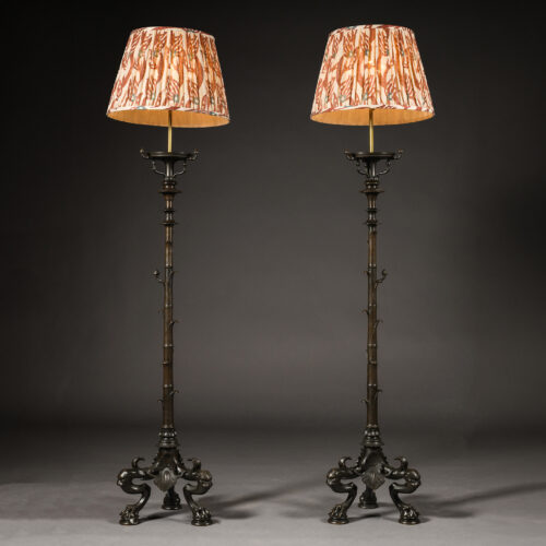 A pair of Neo-Pompeiian patinated bronze torchères fitted as standard lamps, attributed to Maison Barbedienne, Paris, circa 1860.